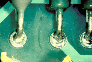 Figure 3: Adhesive contamination on the pad surface caused this solder skip